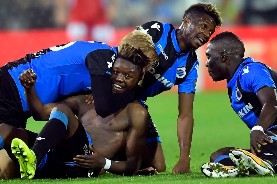 Limbombe celebrates scoring a goal against Oostende