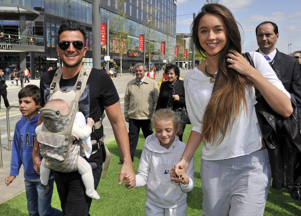  Happy family ... Peter Andre with his wife Emily MacDonagh, daughters Amelia and Princess, and son Junior