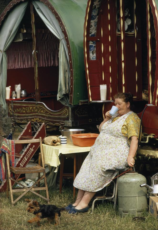  A woman pauses for a cup of tea in the 1970s during the hectic four-day festival, which runs annually from June 7 to June 10