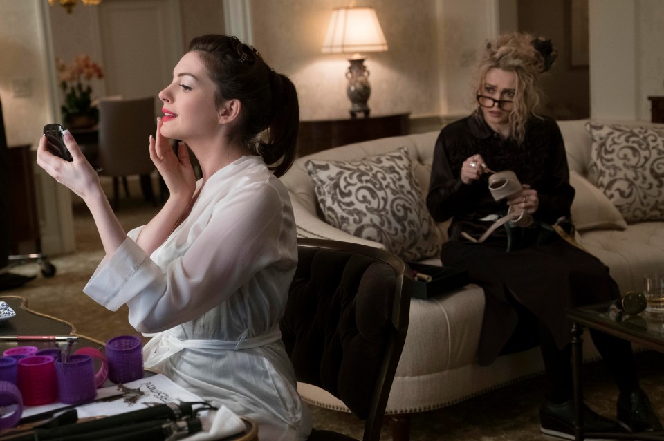 Anne Hathaway, left, who steals nearly every scene in Ocean’s 8 and Helena Bonham Carter