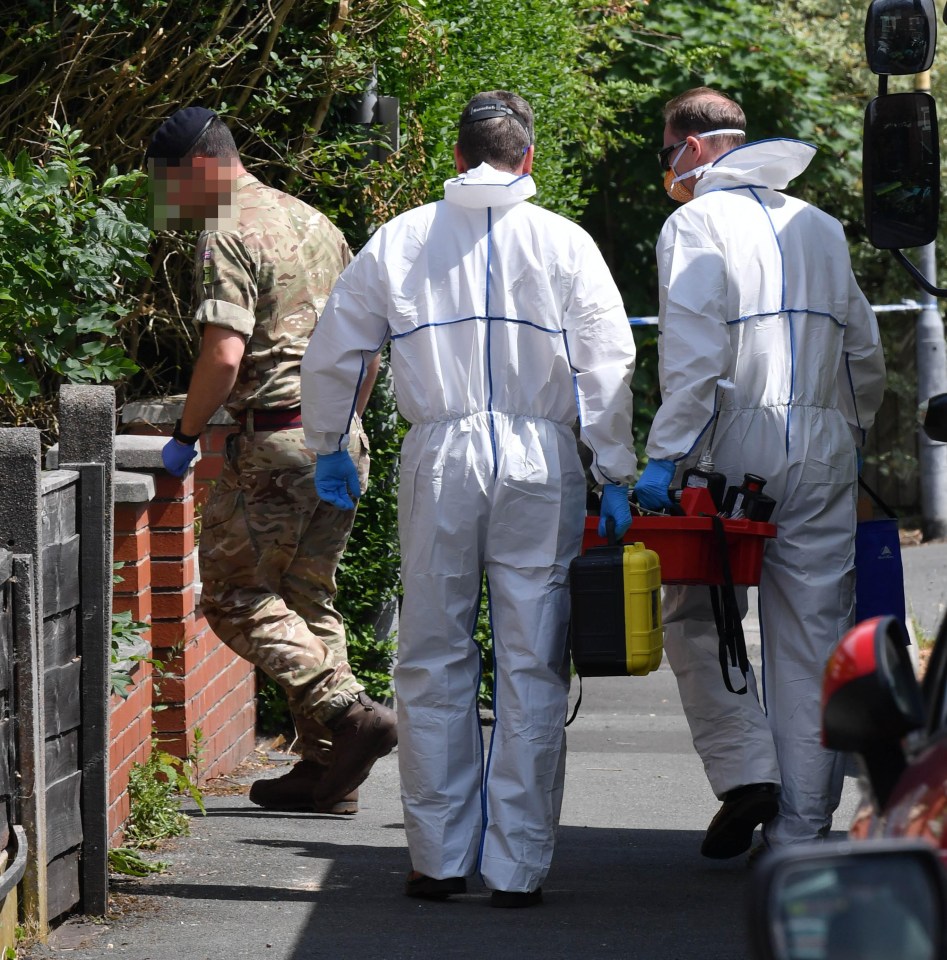 A soldier enters the property followed by a forensics team