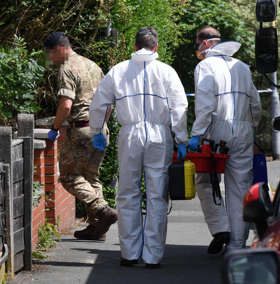  A soldier enters the property followed by a forensics team