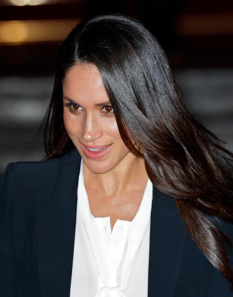  Meghan uses a hair oil to add shine to her glossy brunette locks