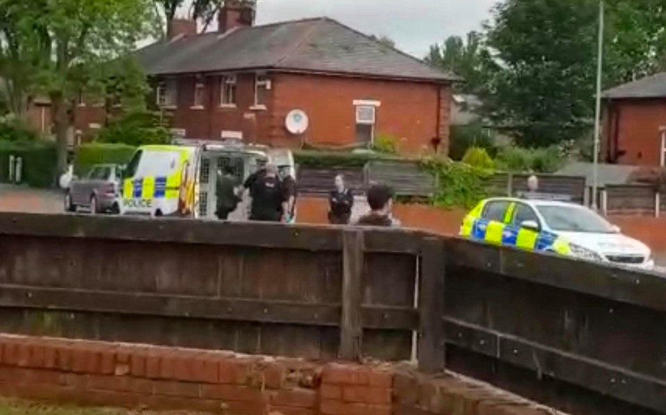 Police on the street outside the property