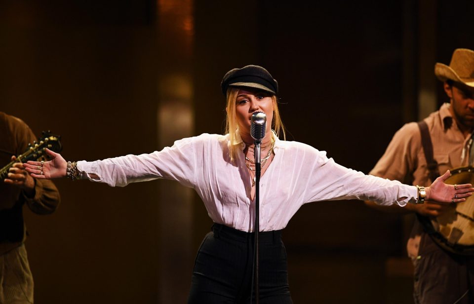  Miley Cyrus performs onstage during the American Film Institute's 46th Life Achievement Award Gala Tribute to George Clooney