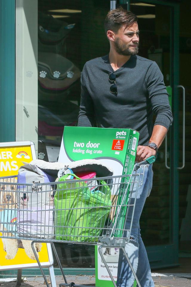  Andrew was seen pushing puppy toys and training pads as he left the shop