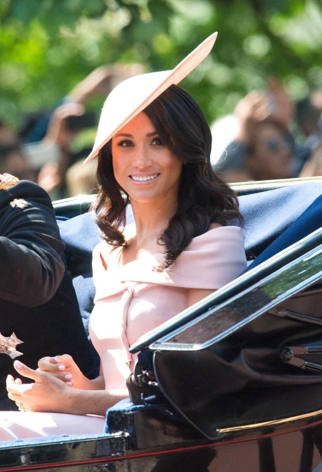  Meghan looked like a modern-day Kate Middleton in this bespoke Carolina Herrera dress