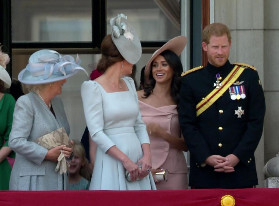  Kate and Meghan share a joke as the royals congregated on the balcony of Buckingham Palace