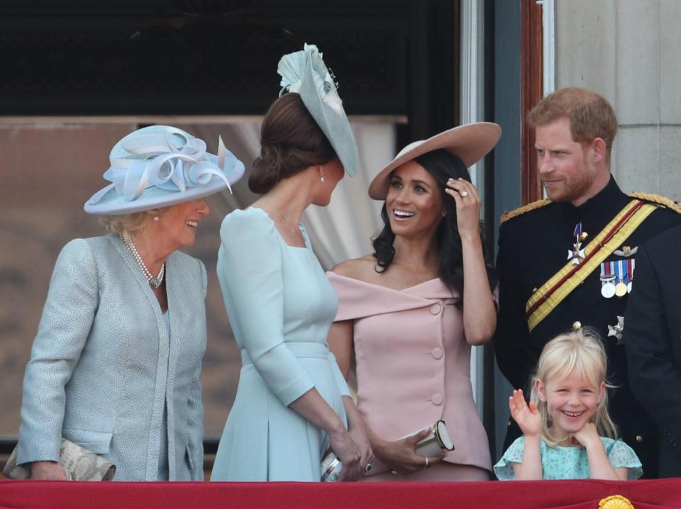  Kate and Meghan chat as the royals gathered on the Buckingham Palace balcony