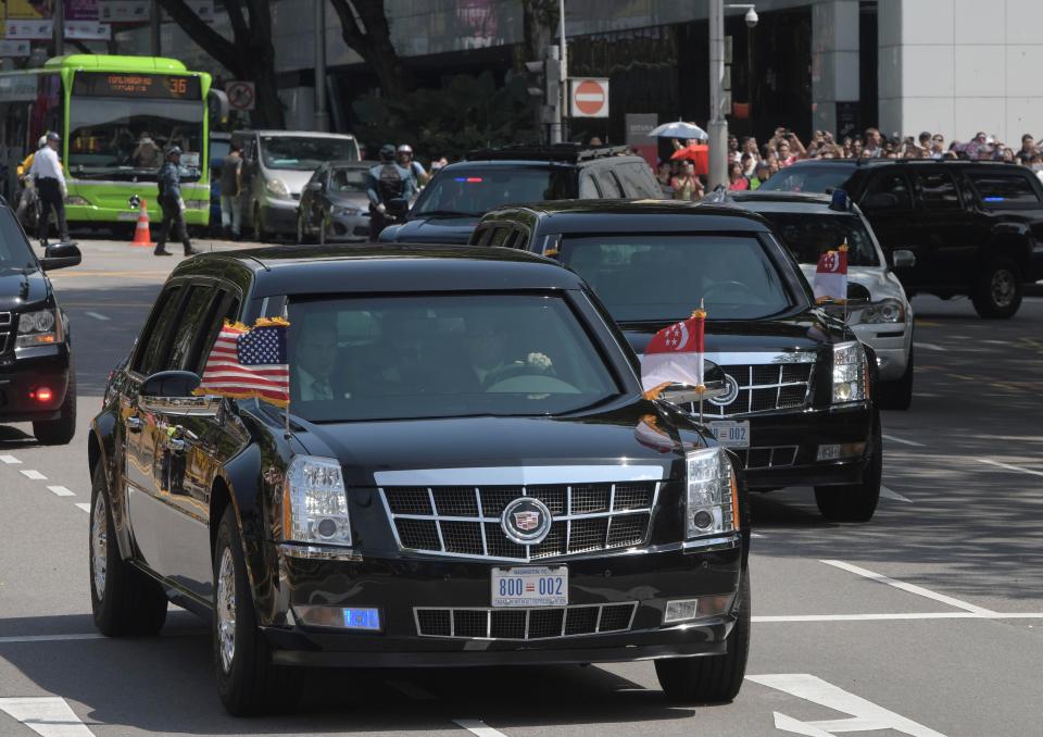  The US motorcade drives down Orchard Road in Singapore