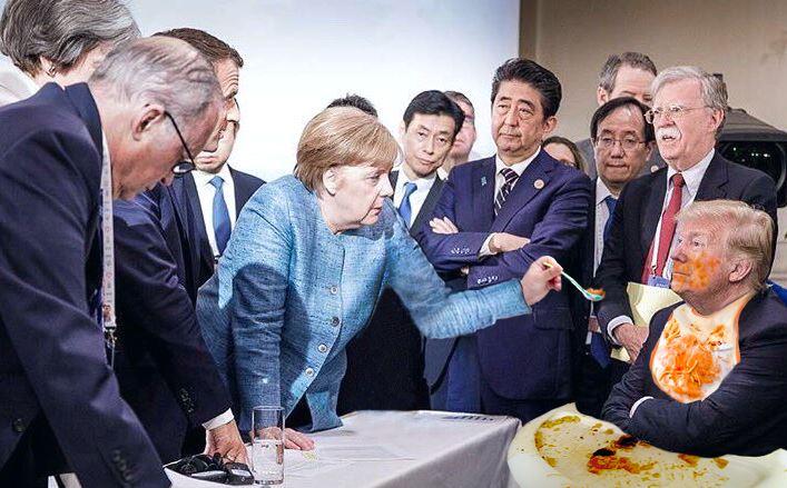  Angela Merkel spoon-feeds a childish Trump with information