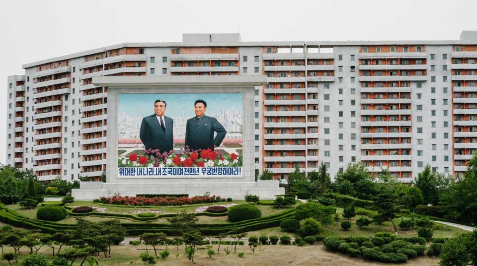  Posters of Kim Jong-il appear on buildings in the city of Pyongyang