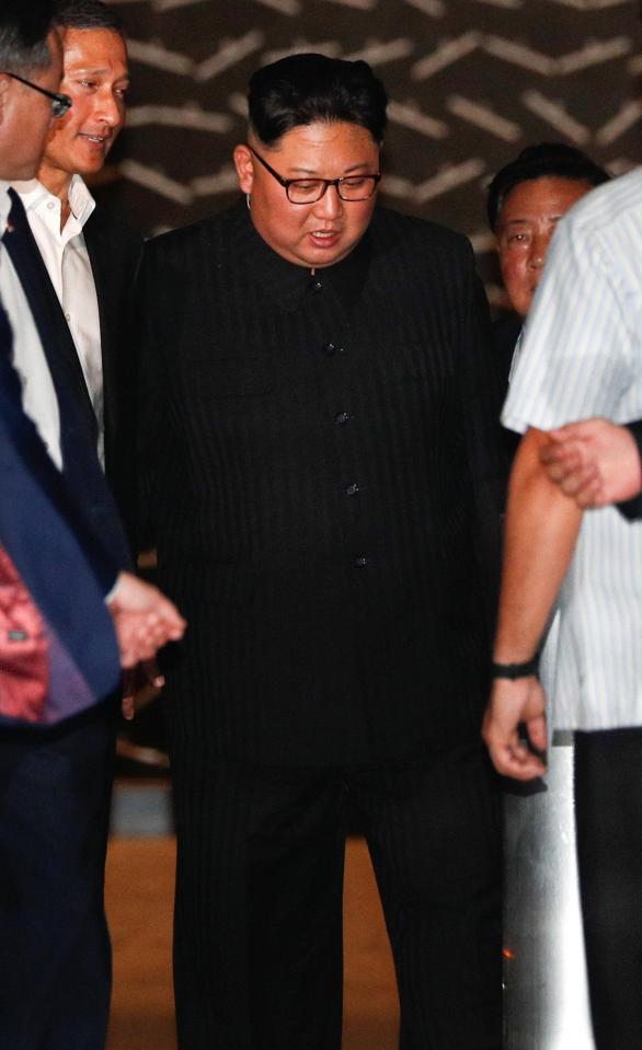  Minded... Kim Jong-un as he leaves his hotel in Singapore on the eve of the summit