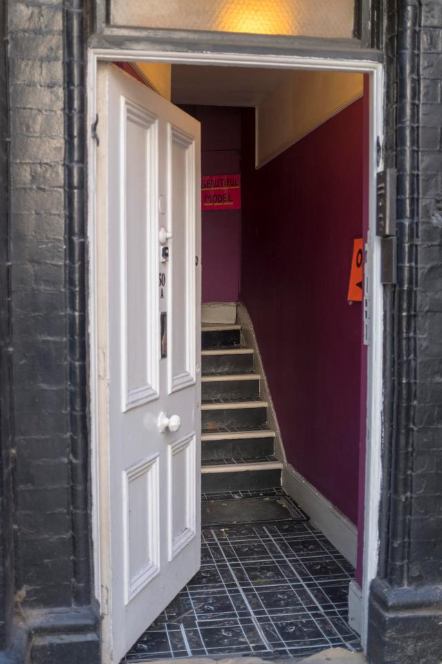  The door of the Mayfair brothel Sorrell was allegedly seen visiting with a sign reading 'Beautiful model'