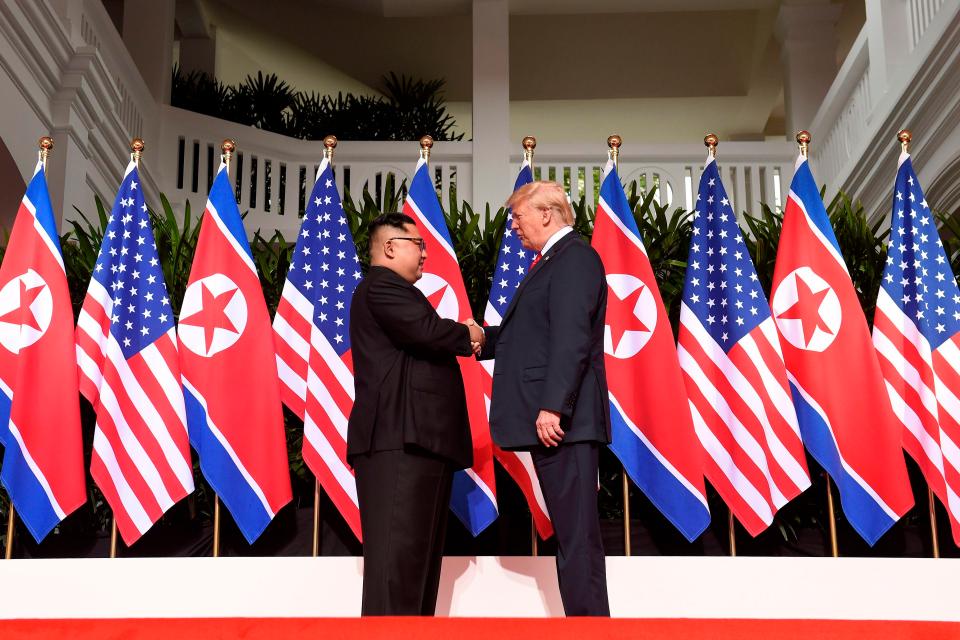  The world leaders share a historic handshake as they meet in Singapore