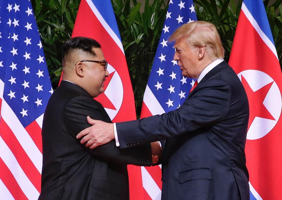  Kim Jong-un shared a historic handshake with Donald Trump before a 41 minute meeting