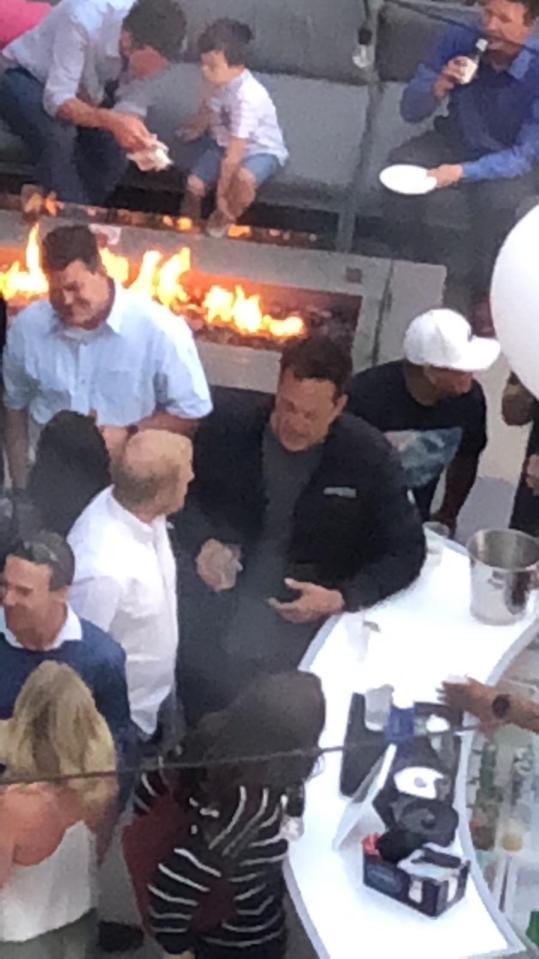  Vince Vaughn can be seen with drink in hand chatting with friends hours before being arrested for a DUI