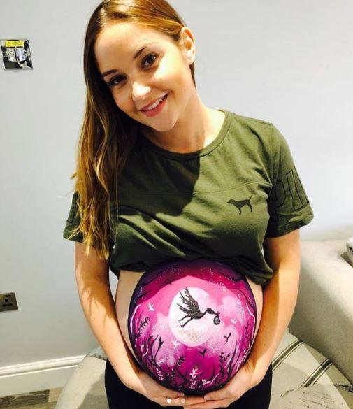  She recently painted her baby belly bright pink as she prepared for the birth