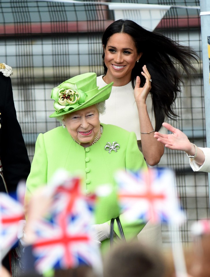 Meghan wore her long hair down with an elegant blowdry