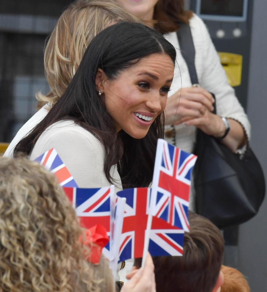  Prince Harry's new wife seemed excited to greet cheering fans