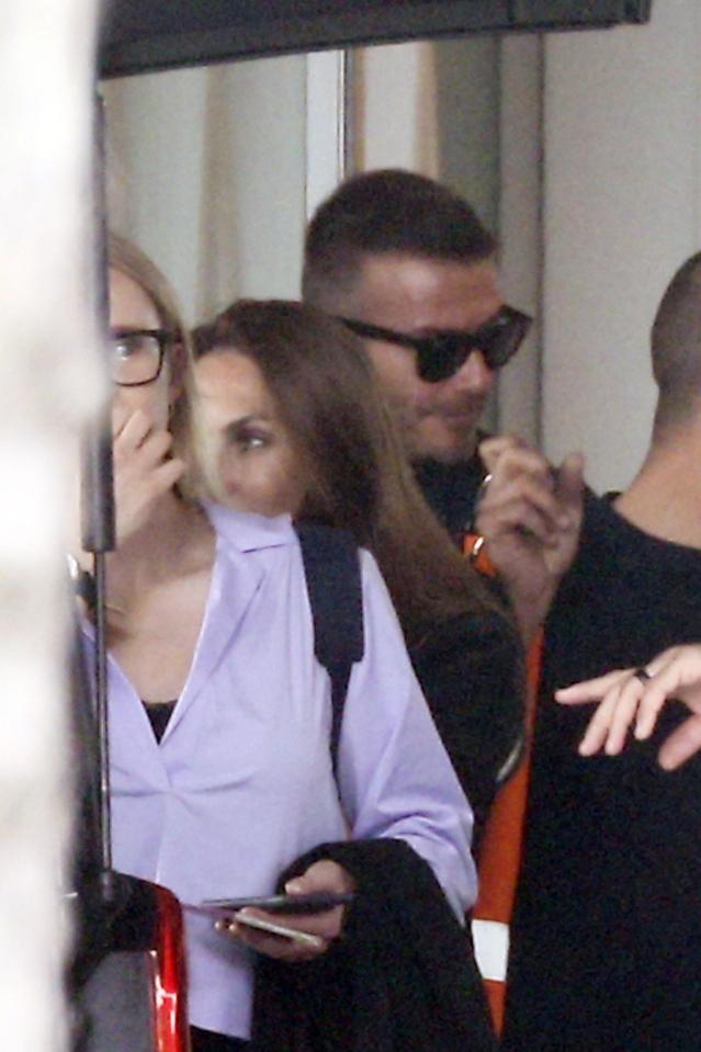  David Beckham wore sunglasses as he left his Milan hotel today