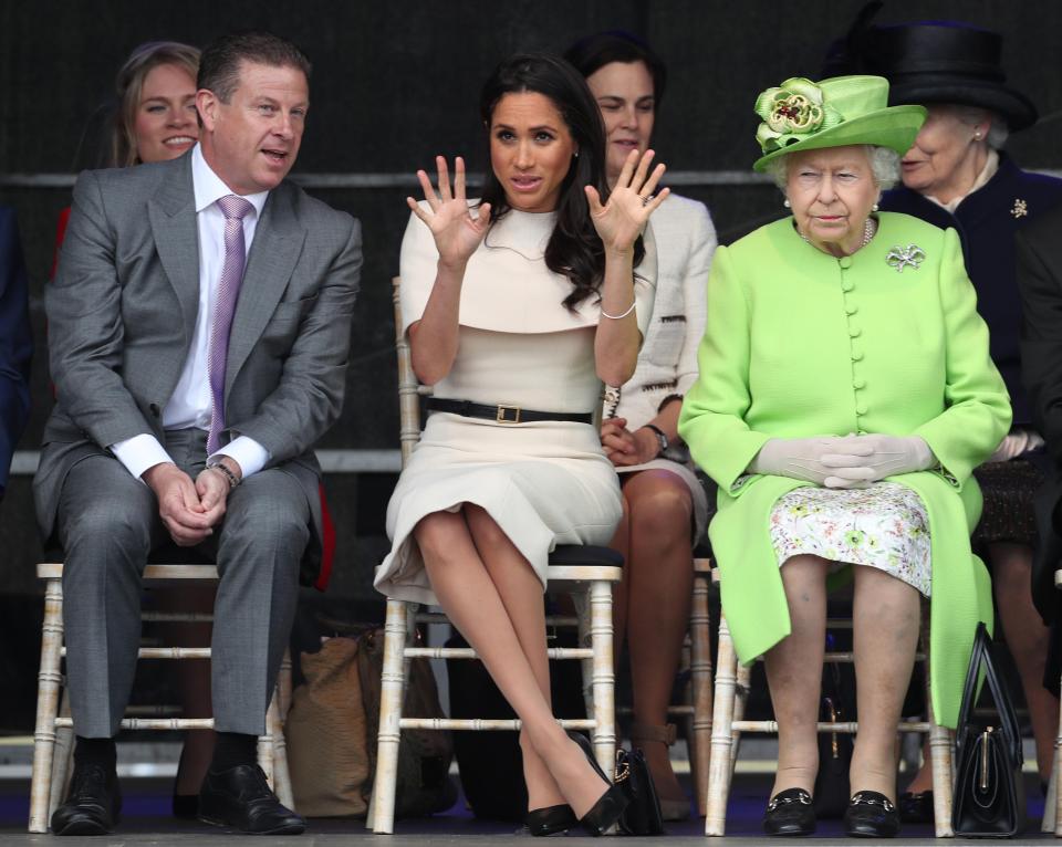  Meghan appeared to be animated as she chatted to locals for the trip