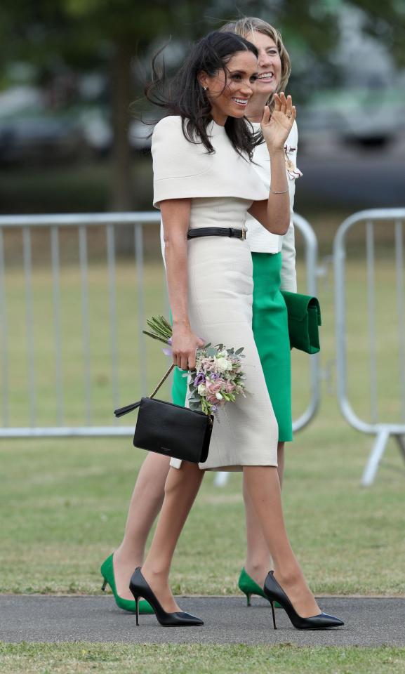  The newest member of the royal family appeared happy as she was taken for her first tour