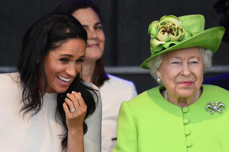  Meghan seemed very at ease - bursting out laughing as the Queen gave a knowing smile