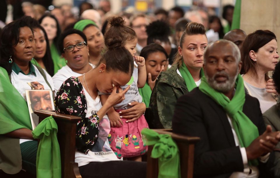  A mourner gets emotional during the memorial service today to remember the victims of the Grenfell Tower fire