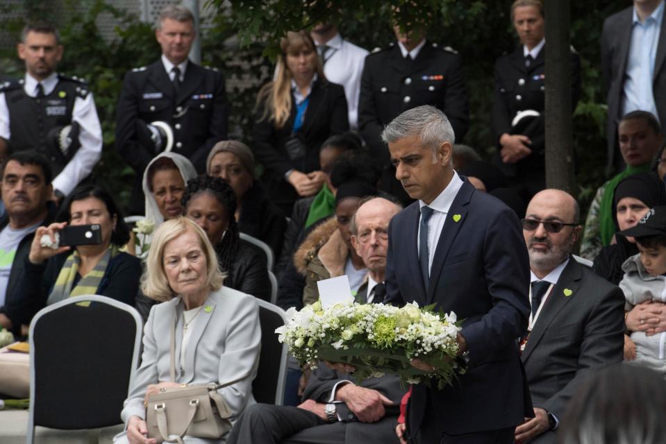  The Mayor of London lays a wreath during the anniversary of the Grenfell Tower fire