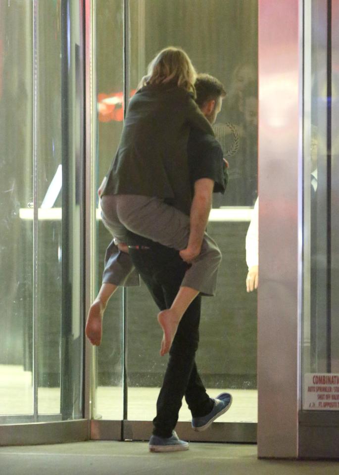  Jennifer Lawrence receives a piggyback from her boyfriend Cooke Maroney