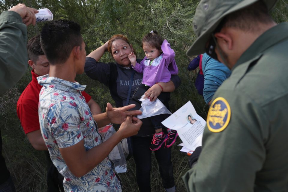  US Border Patrol take a group of Central American asylum seekers into custody near Texas