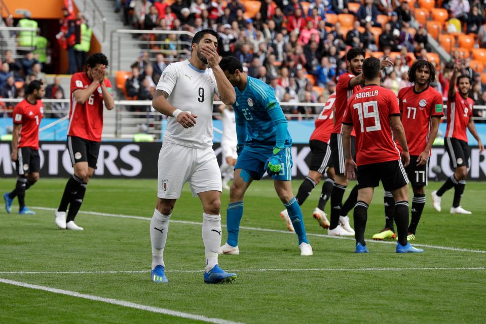  Barcelona striker Suarez reacts after missing a chance at the Yekaterinburg Arena