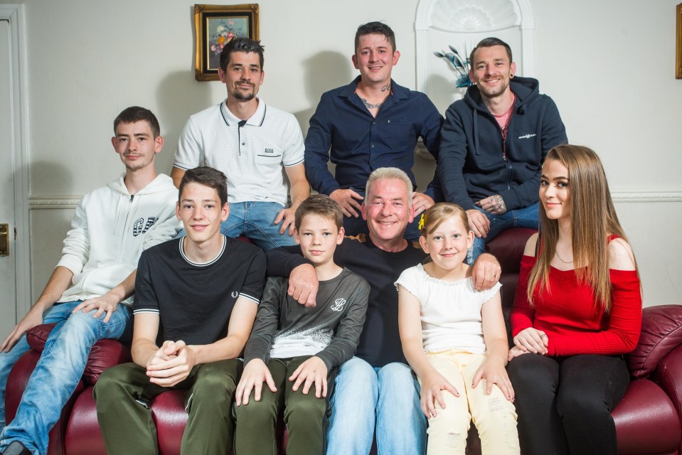 Ian Milthorpe (front centre), 56, a retired miner and father of 8, from Barnsley, South Yorkshire, with his eight children Ryan (top right), 32, Damon (top middle), 29, Rhys (top left), 27, Connor (far left), 19, Jake (front left) and Jade (front right), both 15, Cory (centre left), 12 and Ella (centre right), 11