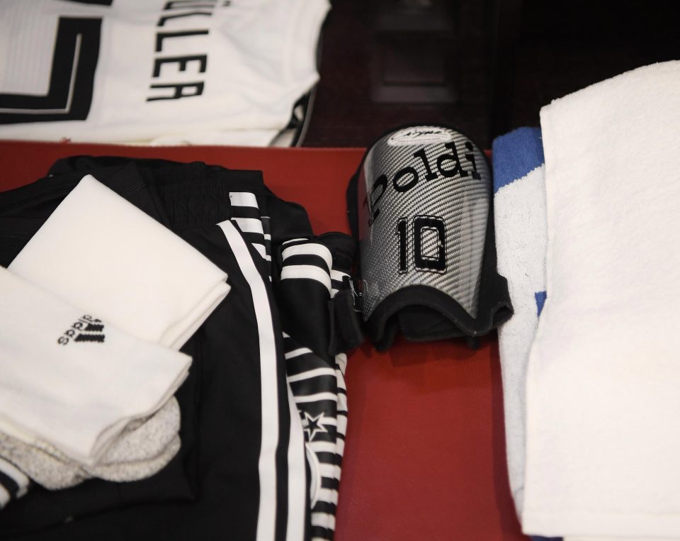 Thomas Muller has a tribute to ex-team-mate Lukas Podolski on his shinpad