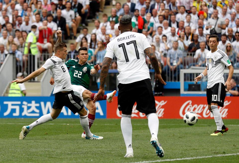  Hirving Lozano smashed Mexico ahead against the defending champions