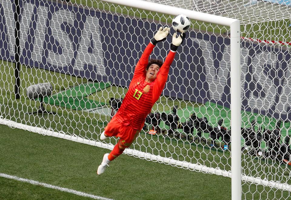  Keeper Ochoa got two hands to Kroos' free-kick and palmed it onto the bar