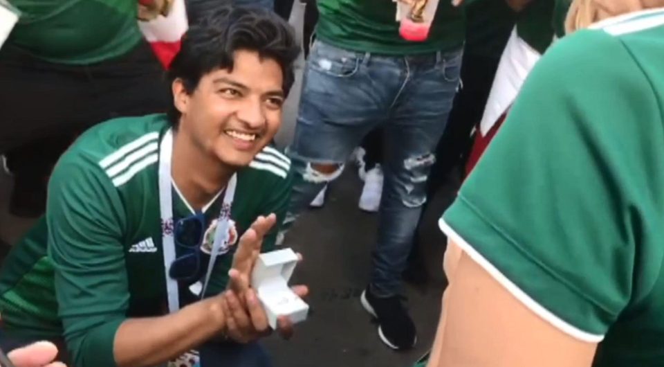  The eyes have it as this Mexico supporter proposed to his girlfriend after they saw their country's historic World Cup victory over Germany