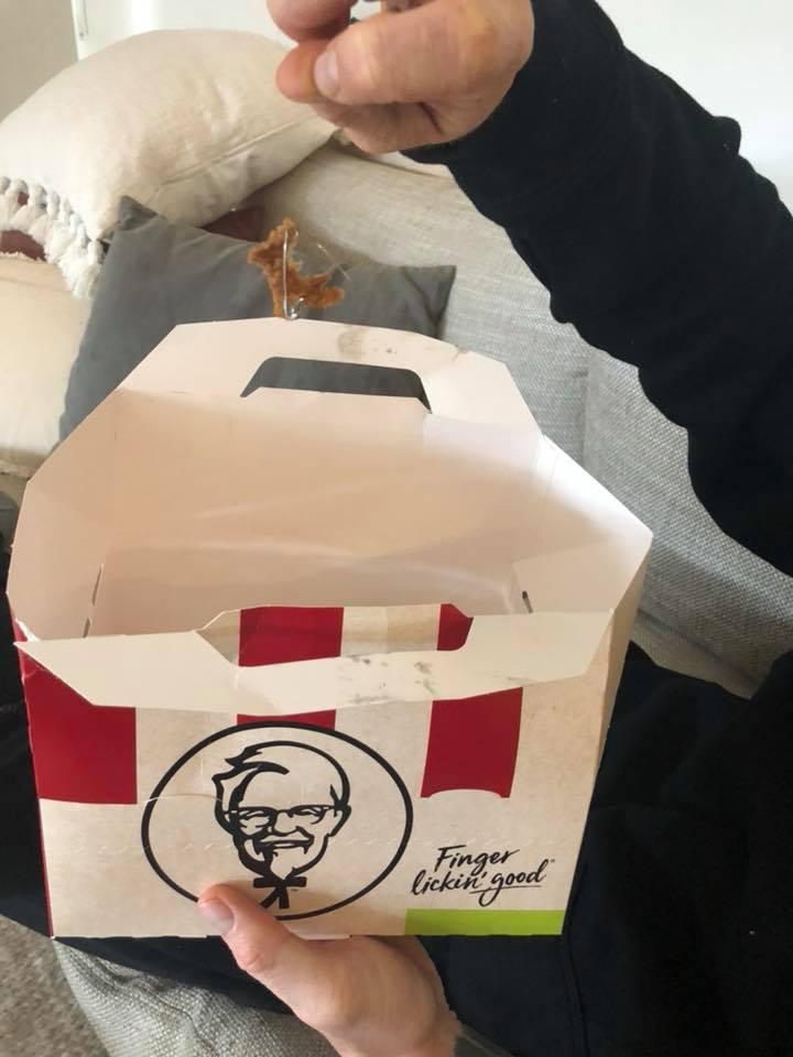  Jamie Allen, from Melbourne, Australia, shared this image on Facebook of a safety pin and strand of hair in his box of fried chicken from KFC