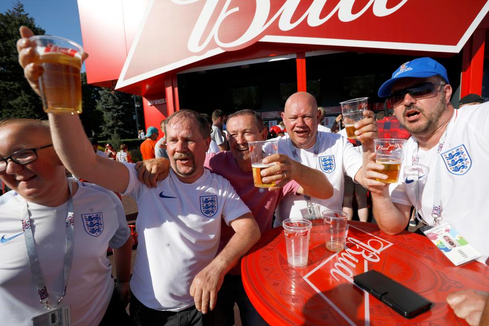  England fans celebrate in Volgograd with a pint