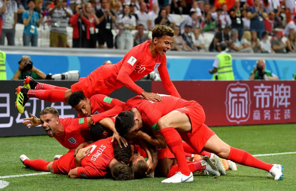  England celebrate their dream start to the World Cup after Harry Kane's opener