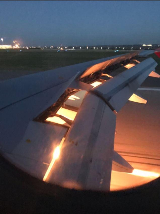  Horrifying pictures show flames billowing from the jet's engines