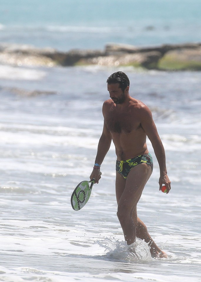 Legend Gianluigi Buffon shrugs off the failure of Italy to reach the world cup finals - by donning budgie smugglers and playing bat and ball on the beach