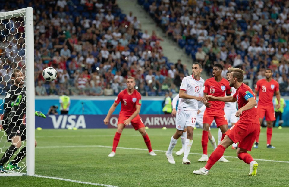  Kane heads in the England winner against Tunisia