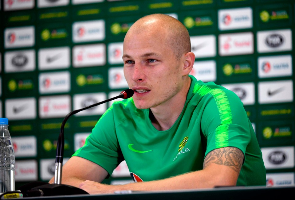 Australia midfielder Aaron Mooy says he is not looking for a move away from Huddersfield