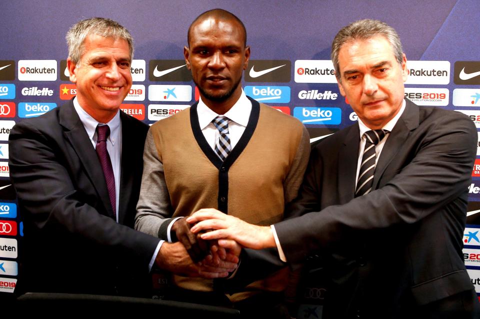  Barca vice-president Jordi Mestre, left with new sporting director Eric Abidal, centre