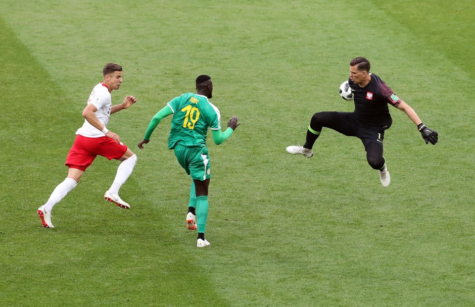 M’Baye Niang prods the ball past Wojciech Szczesny to score Senegal’s second goal