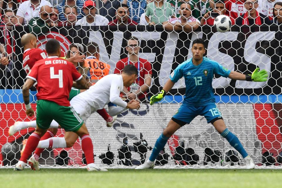  Cristiano Ronaldo dives to head Portugal into an early lead as he scores his fourth goal of Russia 2018