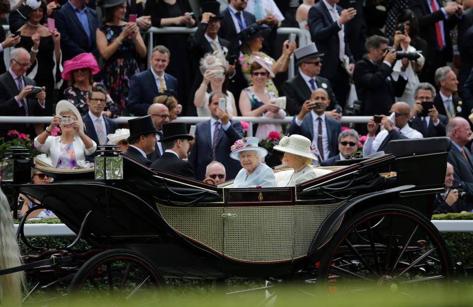  Onlookers burst into applause as the procession made its way into the Parade Ring