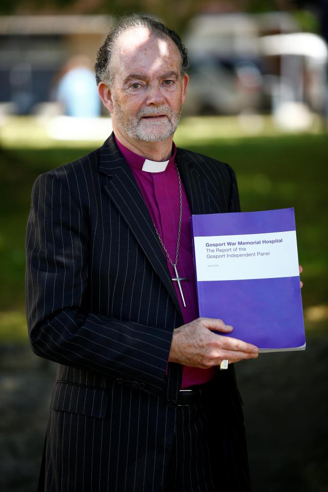  Bishop James Jones, who led the Gosport War Memorial Hospital inquiry panel, holds a copy of the report outside Portsmouth Cathedral in Portsmouth